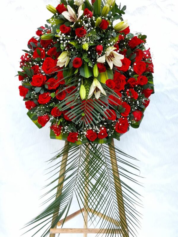 Corona fúnebre flores rojas