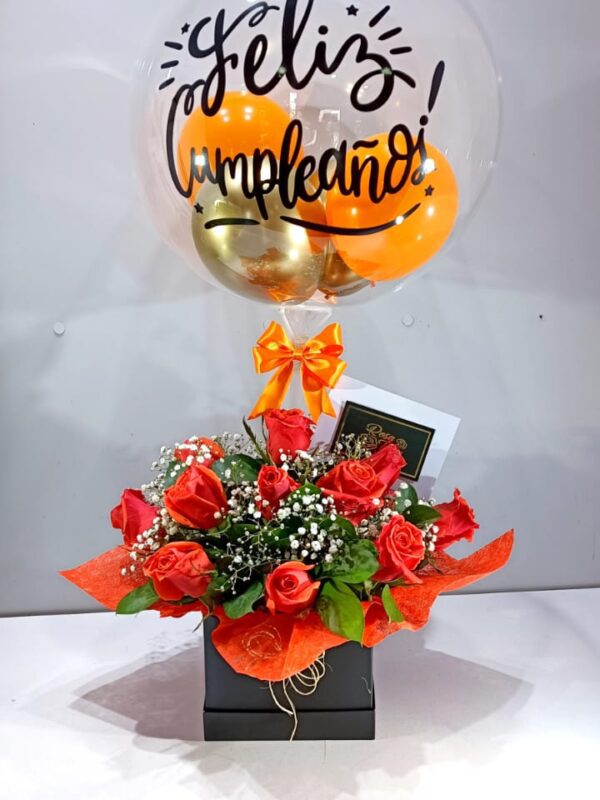 Floristería Bucaramanga - Flores de color naranja con globos en caja