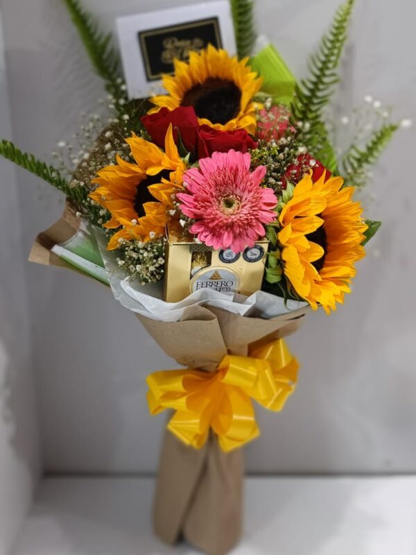 Detalle floral manual con girasoles Y Gerveras